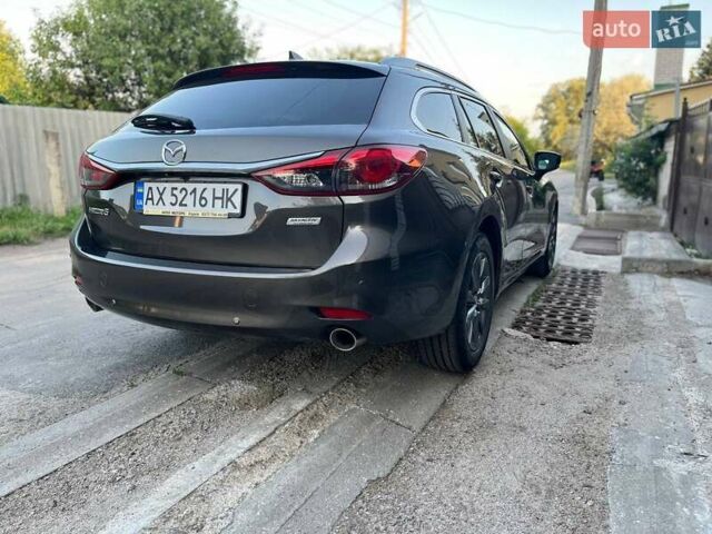 Коричневый Мазда 6, объемом двигателя 2 л и пробегом 121 тыс. км за 15300 $, фото 9 на Automoto.ua