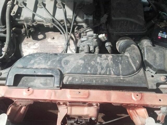 Красный Мазда 6, объемом двигателя 1.8 л и пробегом 294 тыс. км за 1500 $, фото 2 на Automoto.ua