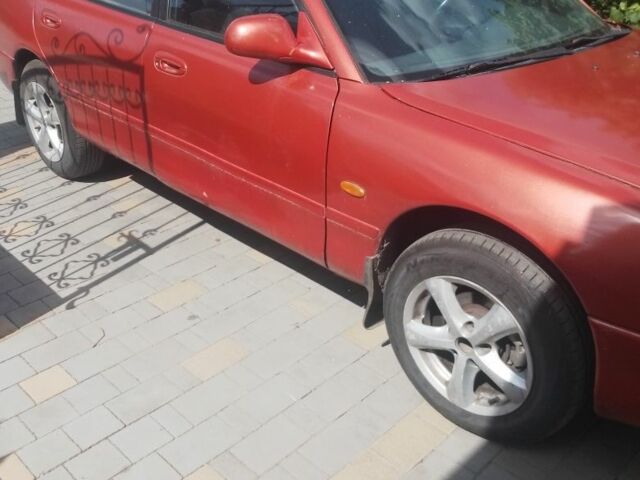 Красный Мазда 6, объемом двигателя 1.8 л и пробегом 294 тыс. км за 1500 $, фото 6 на Automoto.ua