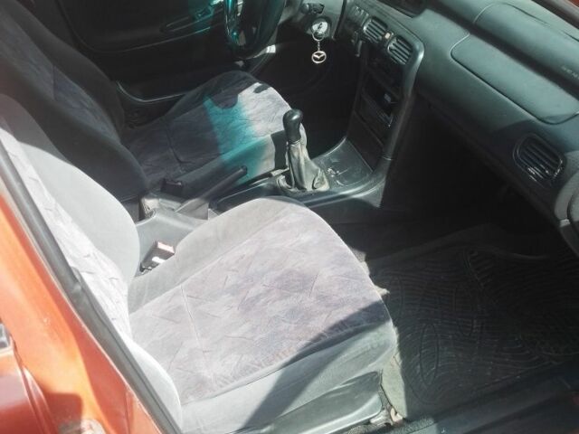 Красный Мазда 6, объемом двигателя 1.8 л и пробегом 294 тыс. км за 1500 $, фото 5 на Automoto.ua