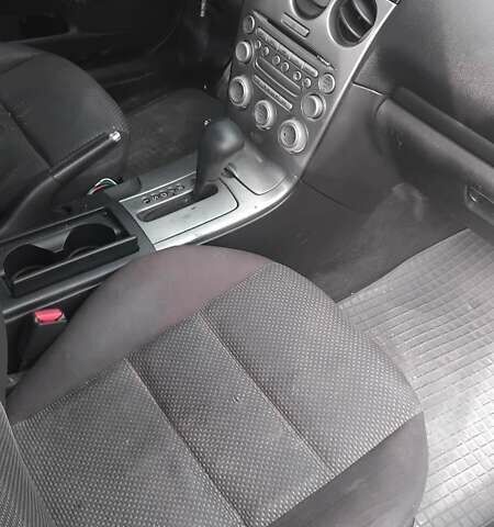 Красный Мазда 6, объемом двигателя 2 л и пробегом 230 тыс. км за 3000 $, фото 3 на Automoto.ua