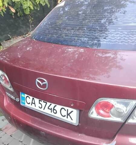 Красный Мазда 6, объемом двигателя 2 л и пробегом 230 тыс. км за 3000 $, фото 2 на Automoto.ua