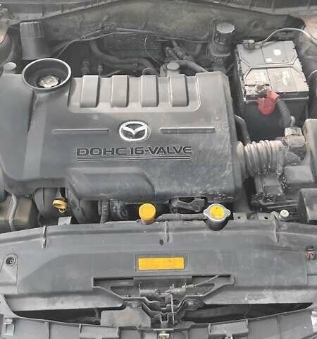 Красный Мазда 6, объемом двигателя 2 л и пробегом 230 тыс. км за 3000 $, фото 4 на Automoto.ua