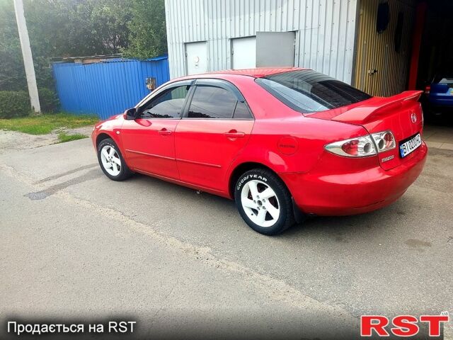 Красный Мазда 6, объемом двигателя 2 л и пробегом 265 тыс. км за 5000 $, фото 4 на Automoto.ua