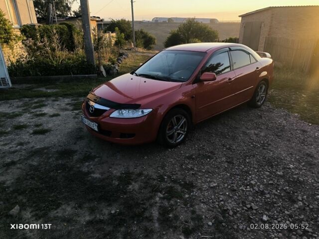 Красный Мазда 6, объемом двигателя 2 л и пробегом 306 тыс. км за 4400 $, фото 3 на Automoto.ua