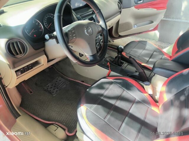 Красный Мазда 6, объемом двигателя 2 л и пробегом 306 тыс. км за 4400 $, фото 7 на Automoto.ua