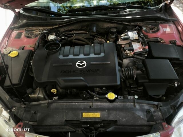 Красный Мазда 6, объемом двигателя 2 л и пробегом 306 тыс. км за 4400 $, фото 9 на Automoto.ua