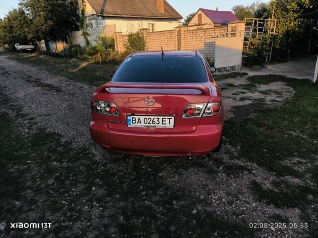 Красный Мазда 6, объемом двигателя 2 л и пробегом 306 тыс. км за 4400 $, фото 5 на Automoto.ua