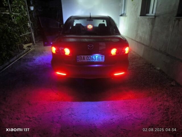 Красный Мазда 6, объемом двигателя 2 л и пробегом 306 тыс. км за 4400 $, фото 13 на Automoto.ua