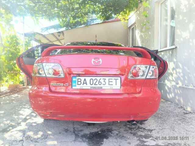 Красный Мазда 6, объемом двигателя 2 л и пробегом 306 тыс. км за 4400 $, фото 6 на Automoto.ua
