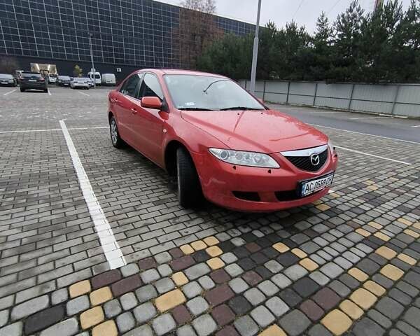 Красный Мазда 6, объемом двигателя 2 л и пробегом 248 тыс. км за 3900 $, фото 2 на Automoto.ua