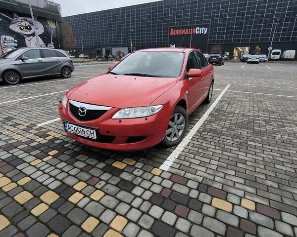Красный Мазда 6, объемом двигателя 2 л и пробегом 248 тыс. км за 3900 $, фото 1 на Automoto.ua
