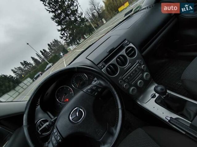 Красный Мазда 6, объемом двигателя 2 л и пробегом 248 тыс. км за 3900 $, фото 11 на Automoto.ua