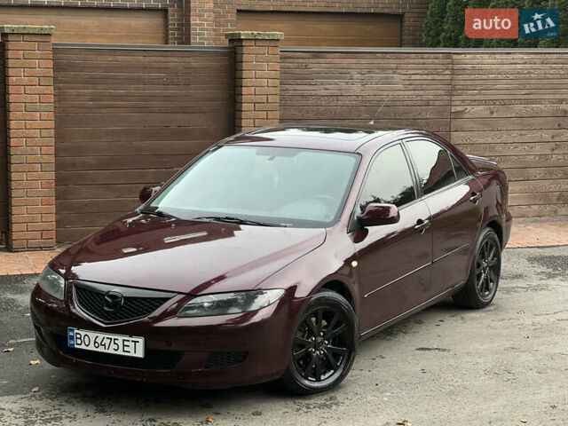 Красный Мазда 6, объемом двигателя 2.3 л и пробегом 250 тыс. км за 4400 $, фото 2 на Automoto.ua