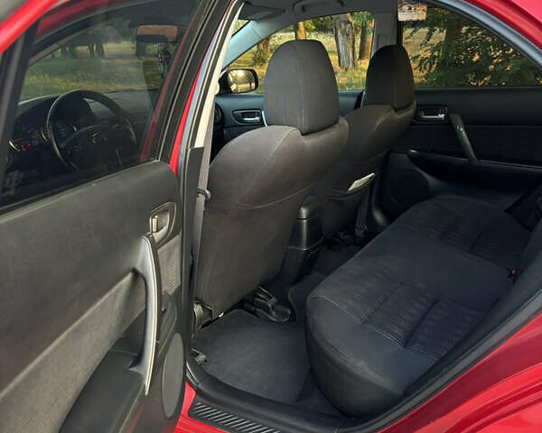 Красный Мазда 6, объемом двигателя 2 л и пробегом 203 тыс. км за 5500 $, фото 8 на Automoto.ua