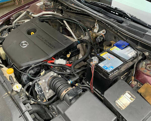 Червоний Мазда 6, об'ємом двигуна 2.3 л та пробігом 260 тис. км за 3700 $, фото 10 на Automoto.ua