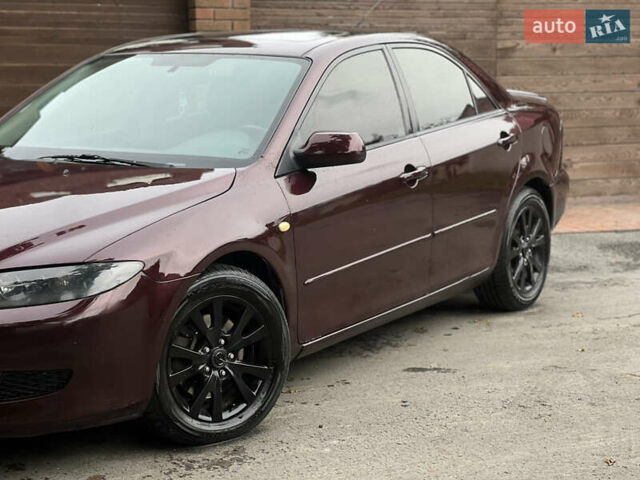Красный Мазда 6, объемом двигателя 2.3 л и пробегом 250 тыс. км за 4400 $, фото 3 на Automoto.ua