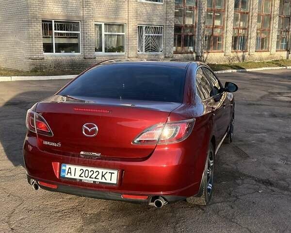 Красный Мазда 6, объемом двигателя 2 л и пробегом 231 тыс. км за 7100 $, фото 1 на Automoto.ua