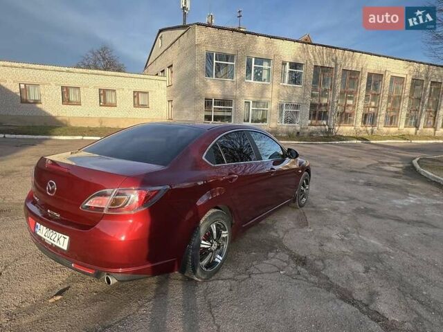 Красный Мазда 6, объемом двигателя 2 л и пробегом 231 тыс. км за 7100 $, фото 4 на Automoto.ua
