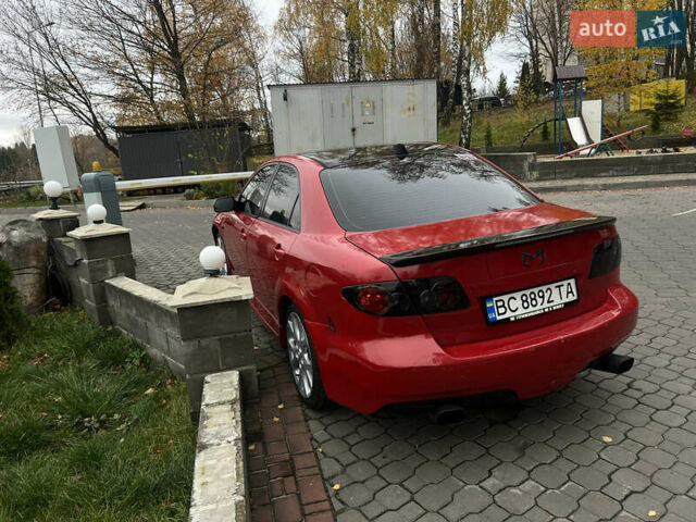 Красный Мазда 6, объемом двигателя 2.26 л и пробегом 152 тыс. км за 5500 $, фото 2 на Automoto.ua