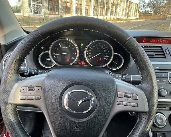 Красный Мазда 6, объемом двигателя 2 л и пробегом 231 тыс. км за 7100 $, фото 17 на Automoto.ua