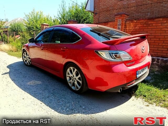 Красный Мазда 6, объемом двигателя 2.5 л и пробегом 249 тыс. км за 6000 $, фото 1 на Automoto.ua