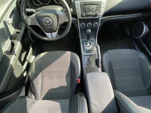 Красный Мазда 6, объемом двигателя 2 л и пробегом 213 тыс. км за 7500 $, фото 5 на Automoto.ua