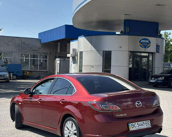 Красный Мазда 6, объемом двигателя 2 л и пробегом 185 тыс. км за 6499 $, фото 1 на Automoto.ua