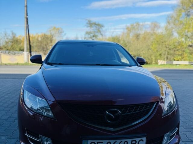 Красный Мазда 6, объемом двигателя 2 л и пробегом 246 тыс. км за 8424 $, фото 1 на Automoto.ua