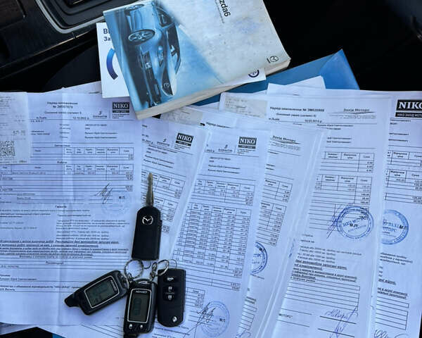 Красный Мазда 6, объемом двигателя 2 л и пробегом 185 тыс. км за 6499 $, фото 17 на Automoto.ua