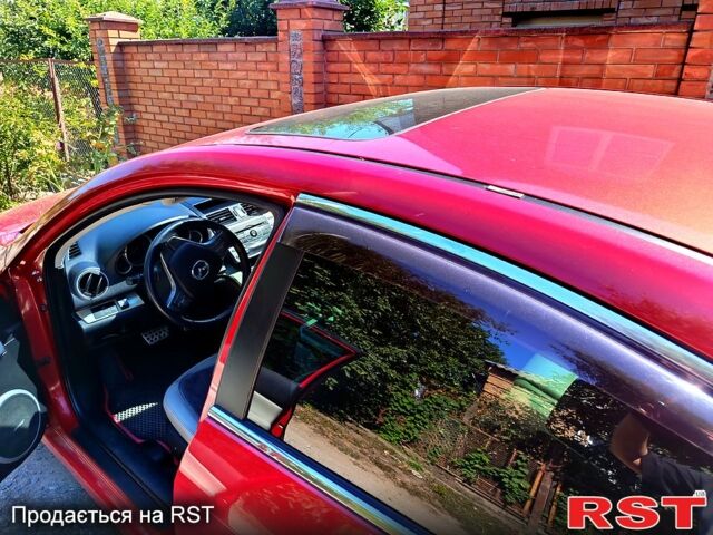 Красный Мазда 6, объемом двигателя 2.5 л и пробегом 249 тыс. км за 6000 $, фото 5 на Automoto.ua