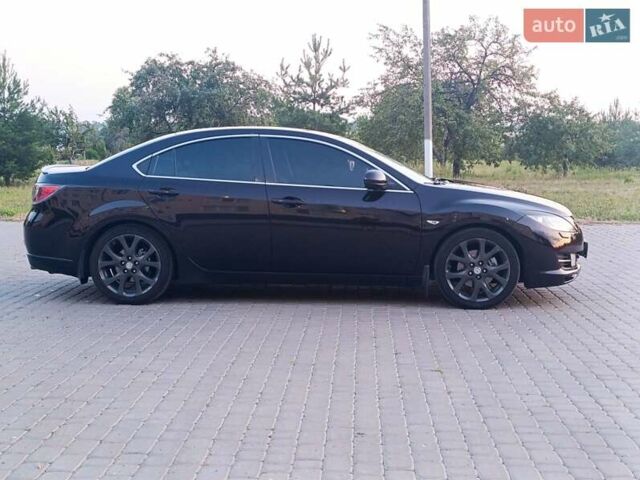 Красный Мазда 6, объемом двигателя 2.5 л и пробегом 236 тыс. км за 7499 $, фото 1 на Automoto.ua