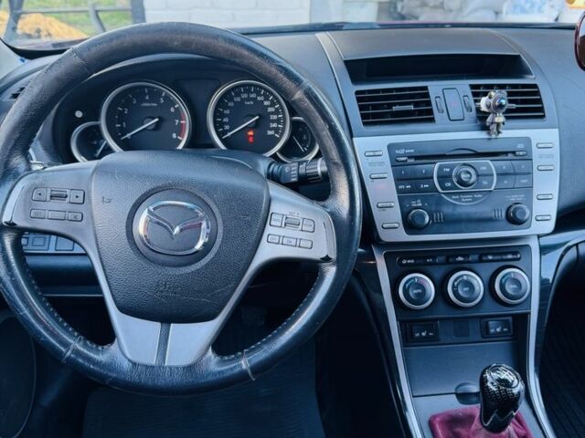 Красный Мазда 6, объемом двигателя 2 л и пробегом 246 тыс. км за 8424 $, фото 3 на Automoto.ua