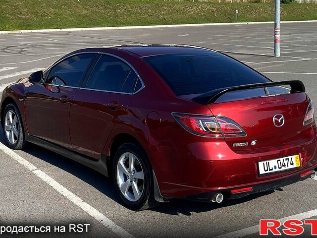 Красный Мазда 6, объемом двигателя 2 л и пробегом 203 тыс. км за 5550 $, фото 1 на Automoto.ua