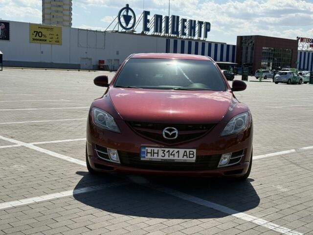 Красный Мазда 6, объемом двигателя 2 л и пробегом 235 тыс. км за 7800 $, фото 1 на Automoto.ua