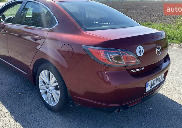 Красный Мазда 6, объемом двигателя 2 л и пробегом 136 тыс. км за 7500 $, фото 3 на Automoto.ua