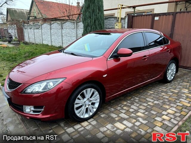 Красный Мазда 6, объемом двигателя 2 л и пробегом 185 тыс. км за 7700 $, фото 4 на Automoto.ua