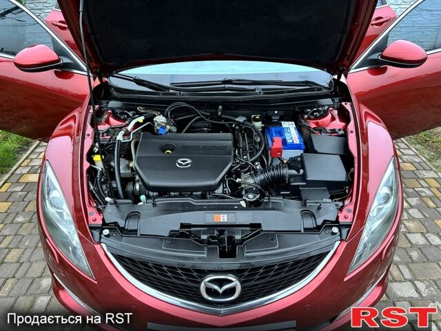 Красный Мазда 6, объемом двигателя 2 л и пробегом 185 тыс. км за 7700 $, фото 6 на Automoto.ua