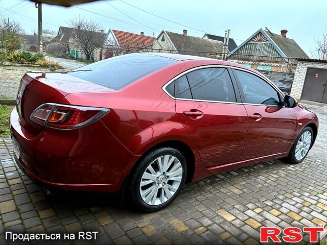 Красный Мазда 6, объемом двигателя 2 л и пробегом 185 тыс. км за 7700 $, фото 1 на Automoto.ua