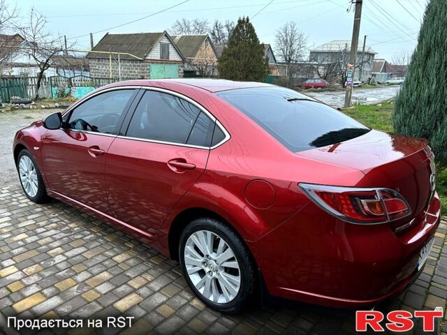 Красный Мазда 6, объемом двигателя 2 л и пробегом 185 тыс. км за 7700 $, фото 2 на Automoto.ua