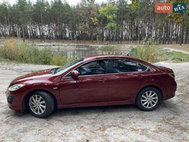 Красный Мазда 6, объемом двигателя 2 л и пробегом 156 тыс. км за 7999 $, фото 1 на Automoto.ua