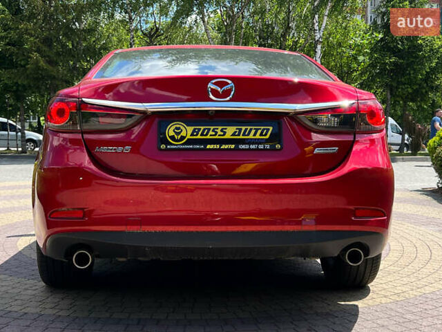 Красный Мазда 6, объемом двигателя 2 л и пробегом 106 тыс. км за 9999 $, фото 5 на Automoto.ua