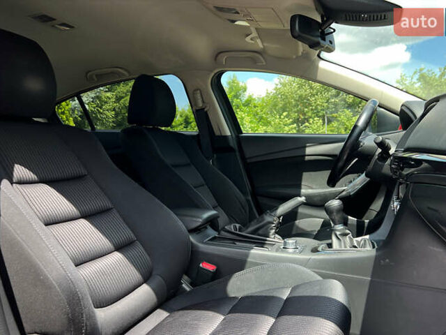 Красный Мазда 6, объемом двигателя 2 л и пробегом 106 тыс. км за 9999 $, фото 8 на Automoto.ua