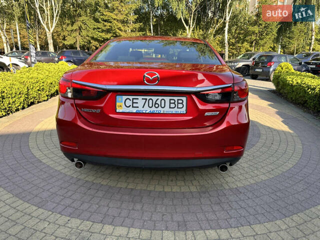 Червоний Мазда 6, об'ємом двигуна 2 л та пробігом 110 тис. км за 9399 $, фото 4 на Automoto.ua