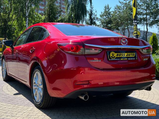 Красный Мазда 6, объемом двигателя 2 л и пробегом 106 тыс. км за 10800 $, фото 4 на Automoto.ua