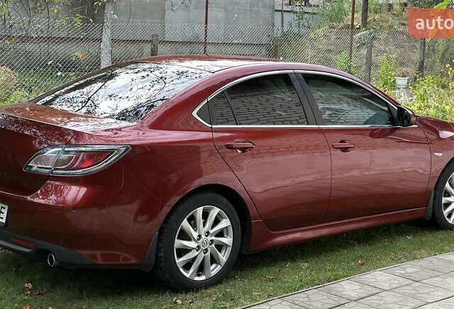Красный Мазда 6, объемом двигателя 2 л и пробегом 138 тыс. км за 10000 $, фото 4 на Automoto.ua