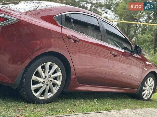 Красный Мазда 6, объемом двигателя 2 л и пробегом 138 тыс. км за 10000 $, фото 5 на Automoto.ua