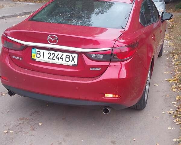 Красный Мазда 6, объемом двигателя 2.49 л и пробегом 190 тыс. км за 10500 $, фото 1 на Automoto.ua