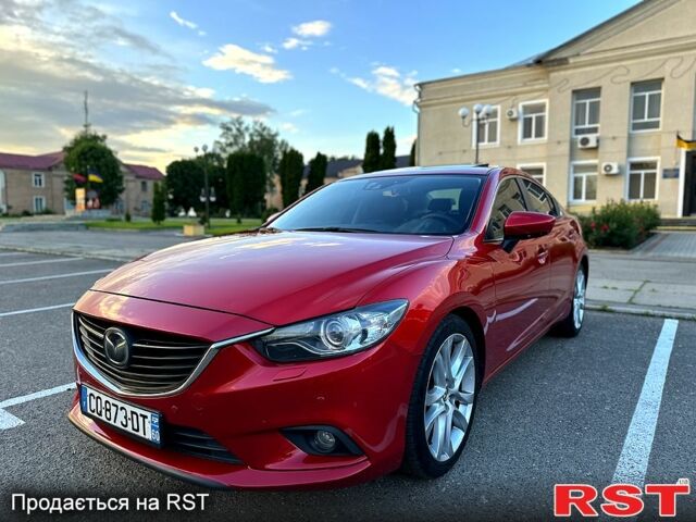 Красный Мазда 6, объемом двигателя 2.2 л и пробегом 165 тыс. км за 11900 $, фото 1 на Automoto.ua