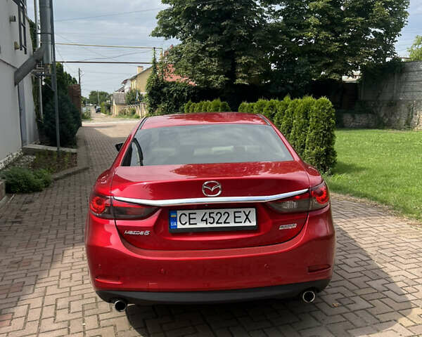 Красный Мазда 6, объемом двигателя 2.5 л и пробегом 204 тыс. км за 11700 $, фото 4 на Automoto.ua